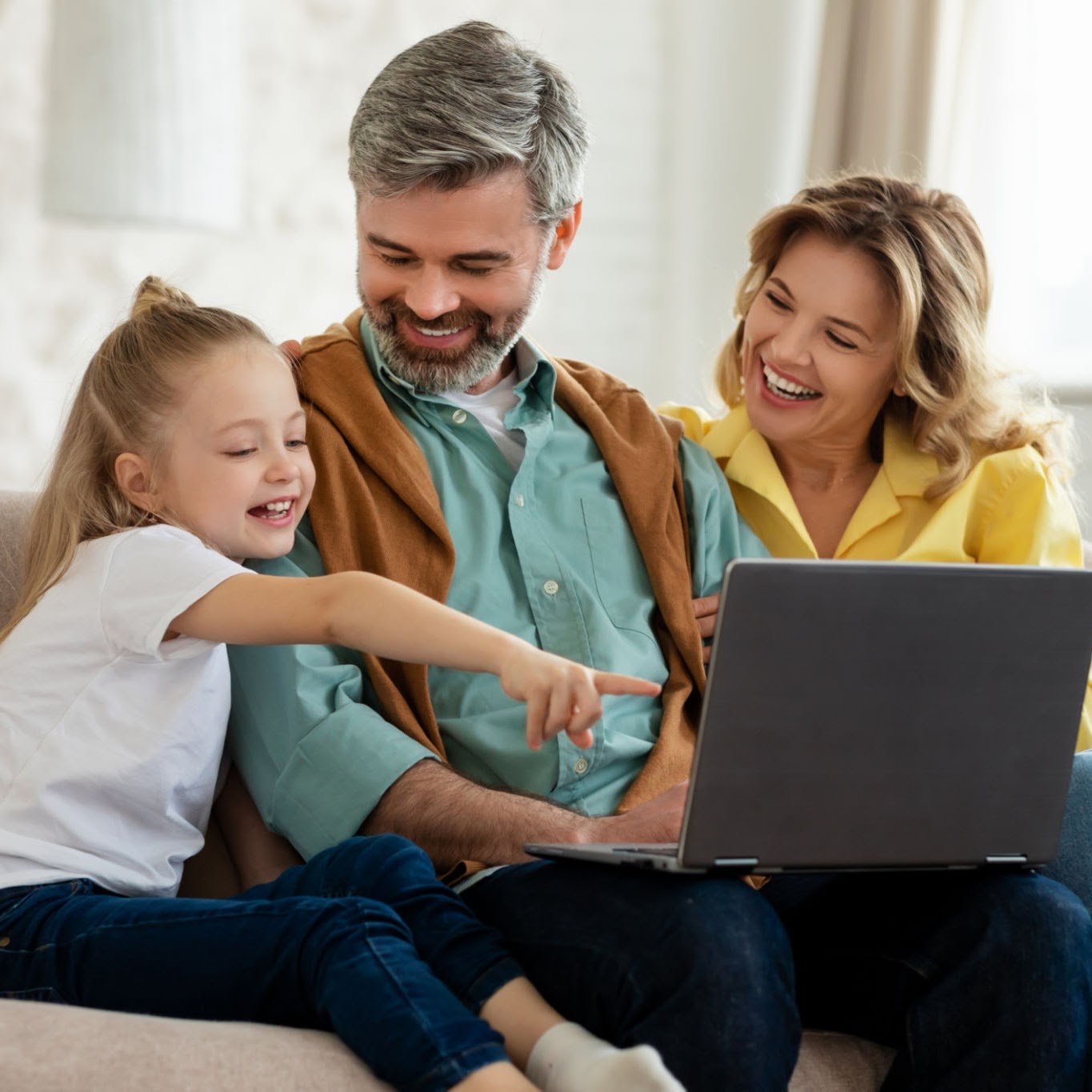 Family enjoying internet and TV at home